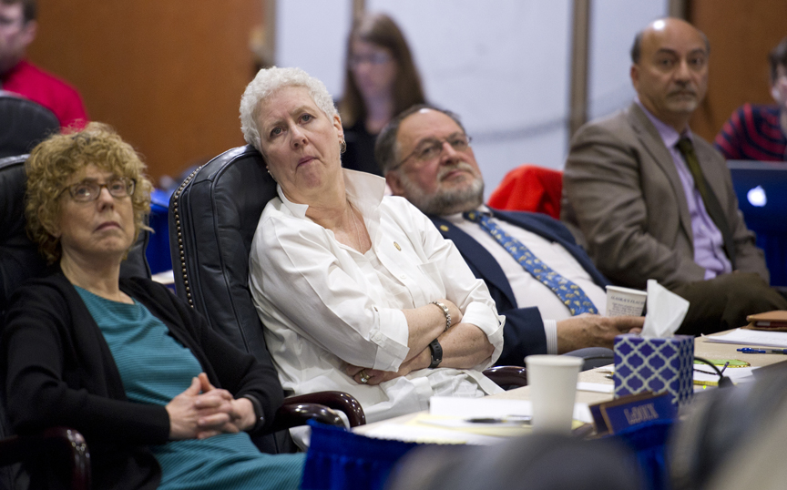 Rep. Gabrielle LeDoux, R-Anchorage, left, Rep. Louise Stutes, R-Kodiak, Rep. Wes Keller, R-Wasilla, and Rep. Les Gara, D-Anchorage, watch the resolution vote to continue work on bills during the special session on Tuesday.
