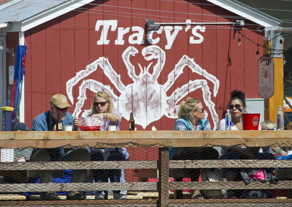 Customers eat at Tracy's King Crab Shack in July.