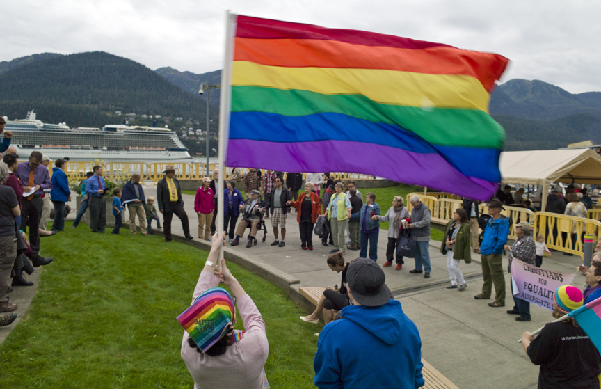 Supporters of the Southeast Alaska Gay and Lesbian Alliance rally at Marine Park before Monday's Assembly meeting.