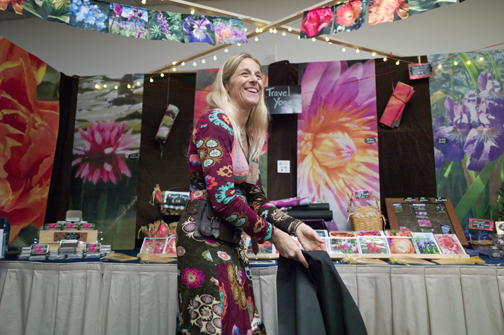 Mandy Ramsey of Haines displays her colorful yoga mats at Public Market in Centennial Hall on Friday.