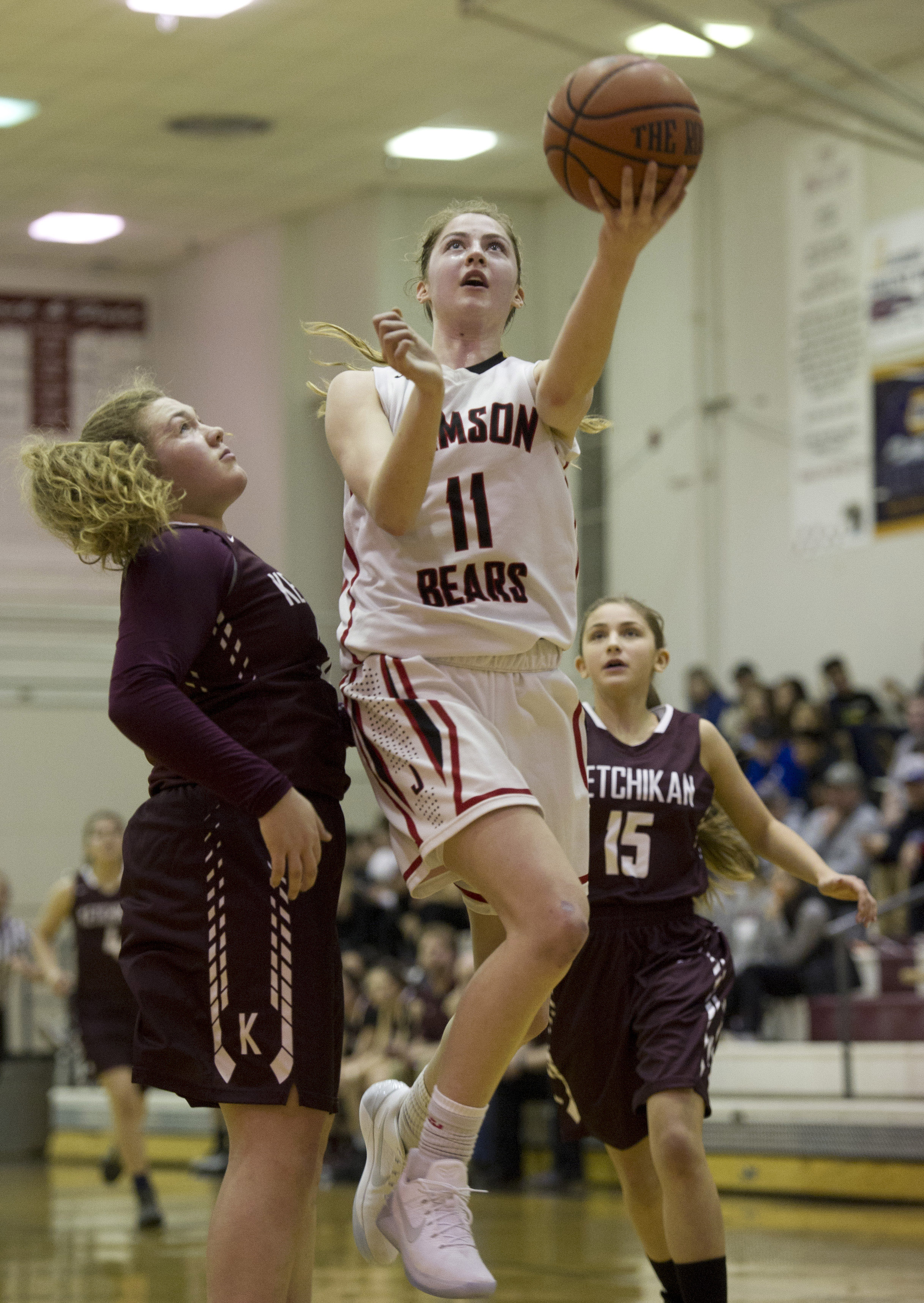 Kendyl Carson drives to the basket during a game against Ketchikan High School. Carson's 26 points on Saturday were her highest total to date.