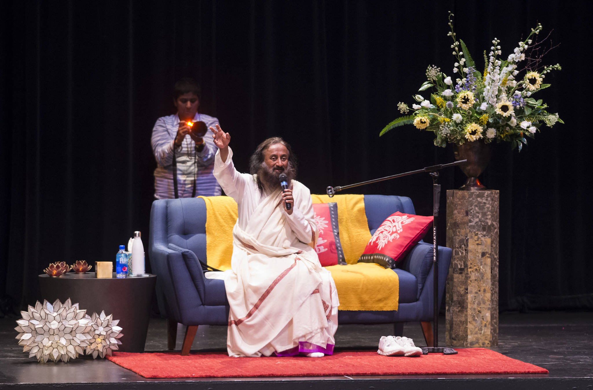 Spiritual leader Sri Sri Ravi Shankar of The Art of Living Foundation leads a group meditation at the Juneau-Douglas High School auditorium on Tuesday, July 31, 2018, as part of his West Coast Tour that also includes San Francisco and Seattle. (Michael Penn | Juneau Empire)