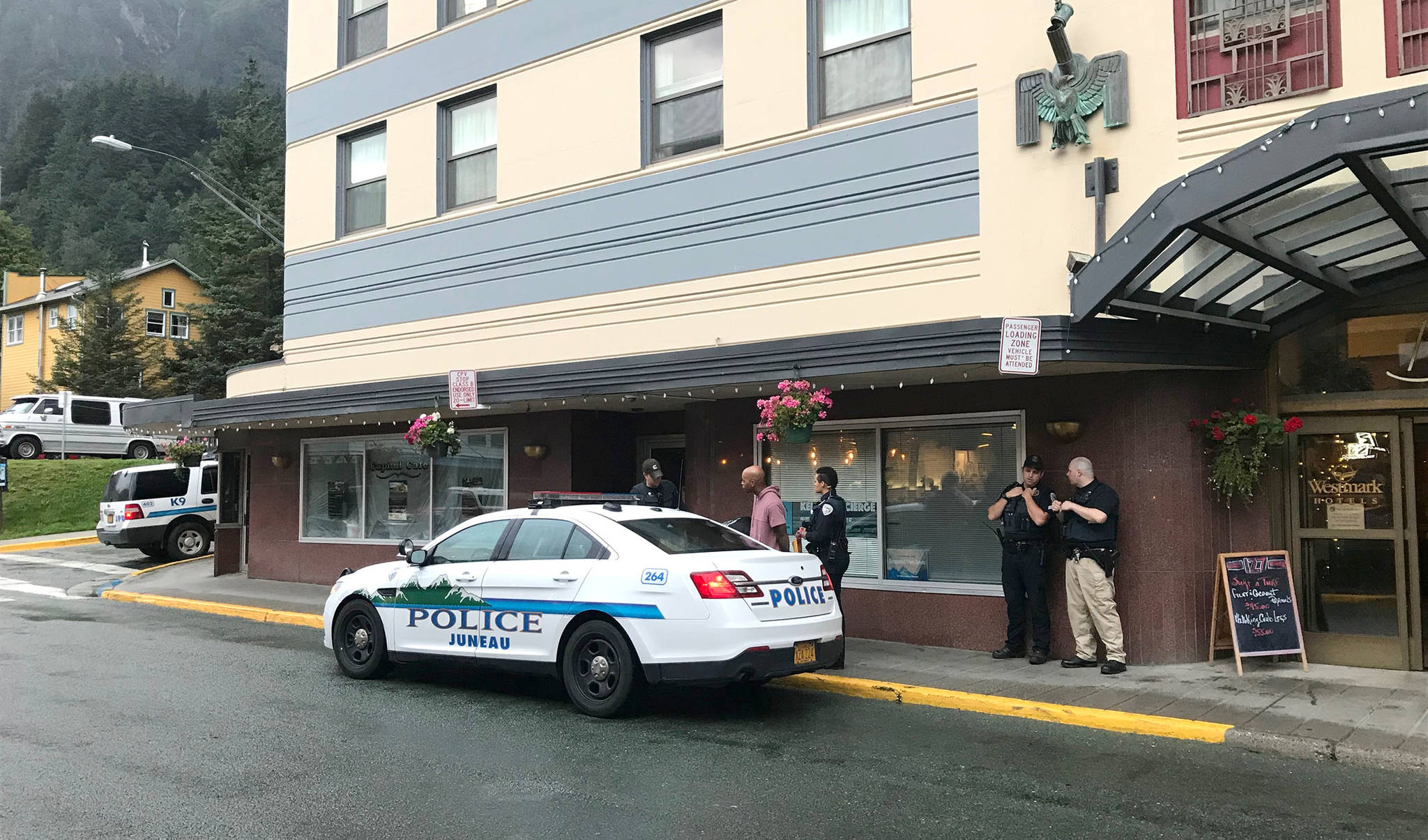 Juneau Police Department officers arrest California resident Kevin Leonard-Kinney at the Baranof Hotel during a drug bust on Friday, Aug. 10, 2018. (Alex McCarthy | Juneau Empire)