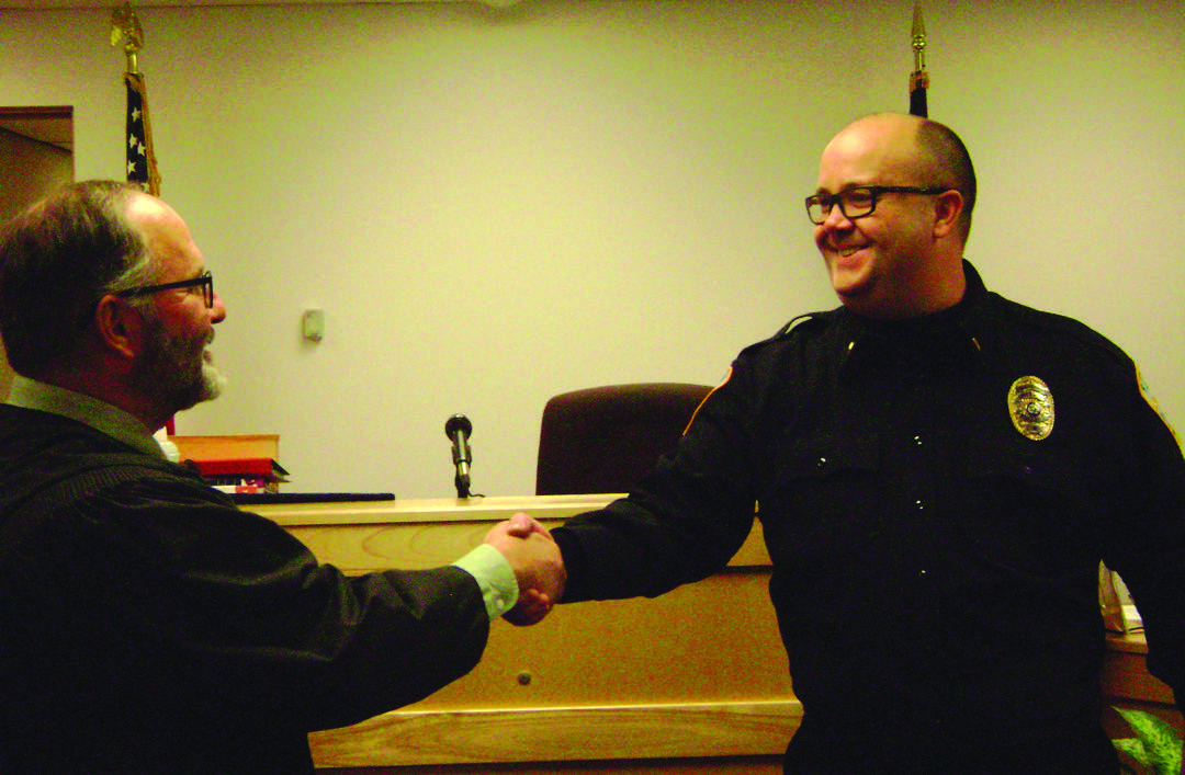 Sitka Police Chief Jeff Ankerfelt (right) was named to the Alaska Marijuana Control Board on May 24. Ankerfelt is the subject of a lawsuit filed this week against the department by current officer Ryan Silva. (Courtesy Photo | Sitka Police Department)