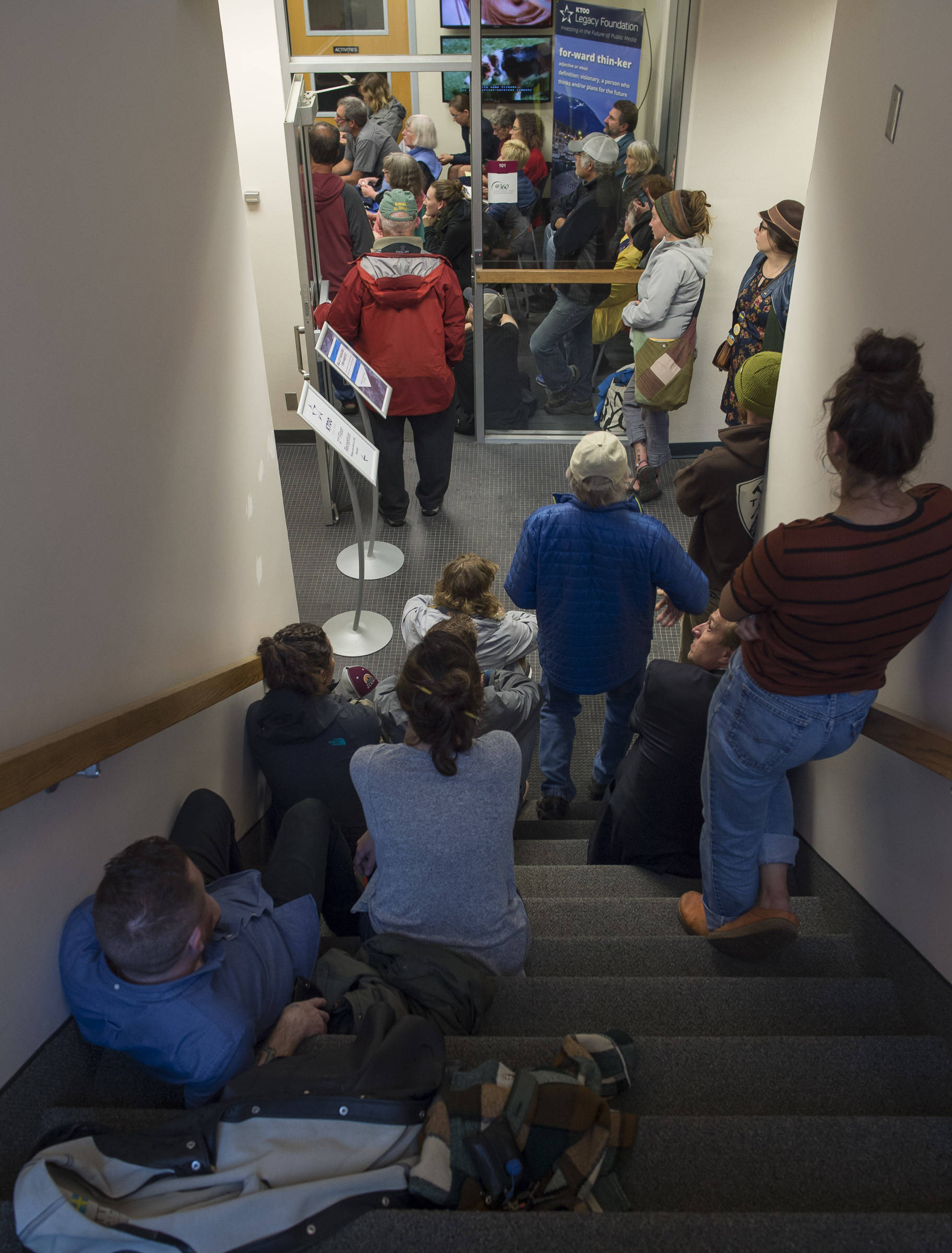 Interested members of the public overflow multiple rooms to listen to a forum on Ballot Measure 1 at @360 Studio on Monday, Aug. 27, 2018. The forum was sponsored by the Juneau Economic Development Council, KTOO and the Juneau Empire. (Michael Penn | Juneau Empire)