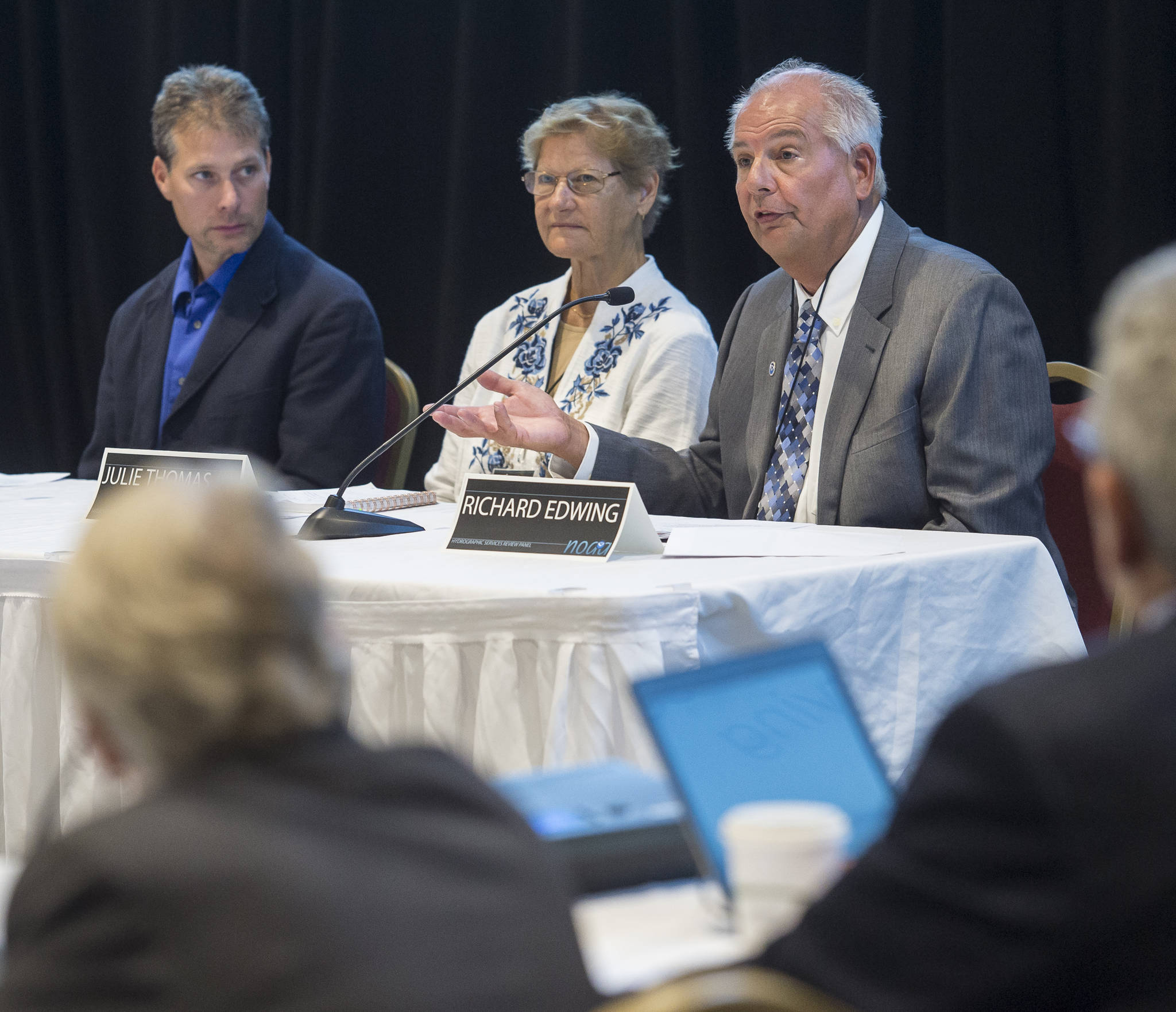 Rich Edwing, Director of the Center for Operational Oceanographic Products and Services for NOAA, right, speaks about Alaska water level partnerships during NOAA’s Hydrographic Services Review Panel meetings taking place at the Elizabeth Peratrovich Hall on Tuesday, Aug. 28, 2018. (Michael Penn | Juneau Empire)