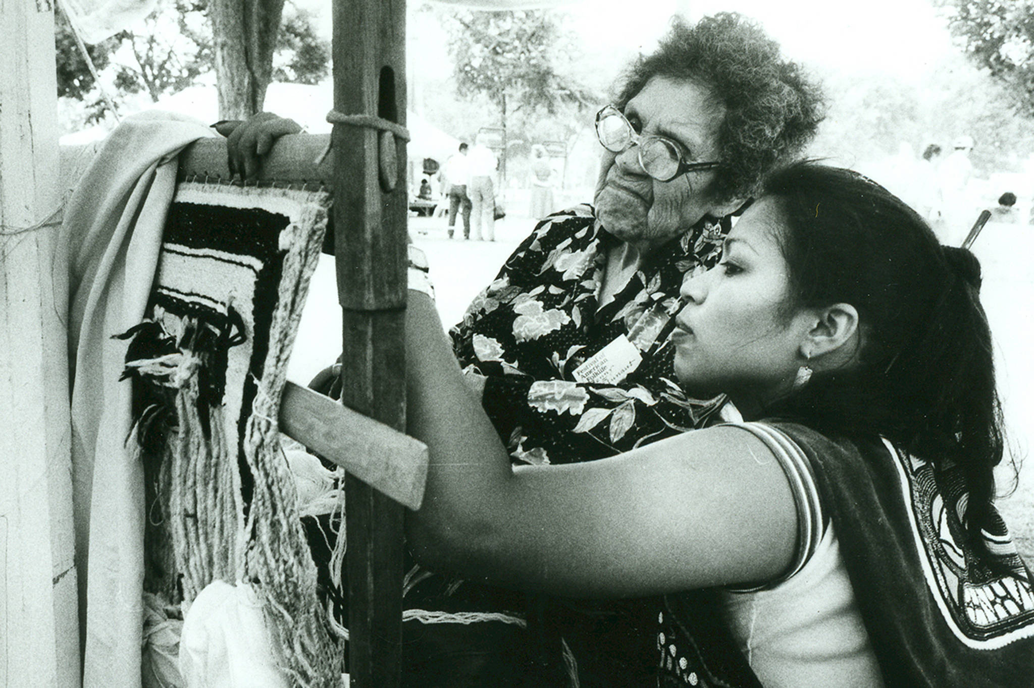 Jennie Thlunaut (left) with weaving apprentice Anna Brown Ehlers. Thlunaut and Ehlers both were named National Heritage Fellows by the National Endowment for the Arts in 1986 and 2017 respectively. The award is the nation’s highest honor in folk and traditional arts. (Courtesy Photo | William L. Paul, Sr., Sealaska Heritage Institute)