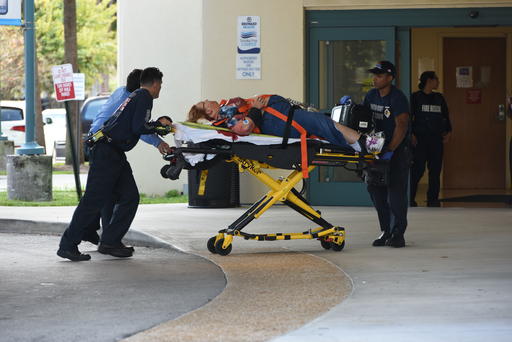 A shooting victim is taken into Broward Health Trauma Center in Fort Lauderdale, Florida on Friday. Authorities said multiple people have died after a lone suspect opened fire at the Ft. Lauderdale, Florida, international airport.