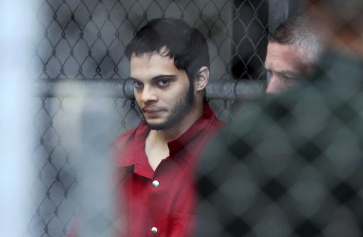 Esteban Santiago is taken from the Broward County main jail as he is transported to the federal courthouse in Fort Lauderdale, Florida on Monday, Jan. 9, 2017. Santiago is accused of fatally shooting several people at a crowded Florida airport baggage claim and faces airport violence and firearms charges that could mean the death penalty if he's convicted.