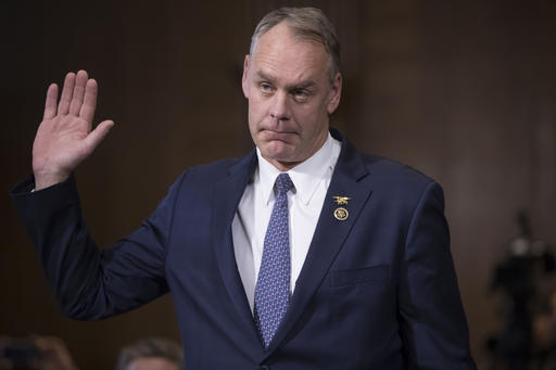 Interior Secretary-designate, Rep. Ryan Zinke, R-Mont., is sworn in on Capitol Hill in Washington, Tuesday, Jan. 17, 2017, prior to testifying at his confirmation hearing before the Senate Energy and Natural Resources Committee. Zinke, 55, a former Navy SEAL who just won his second term in Congress, was an early supporter of President-elect Donald Trump and, like his prospective boss, has expressed skepticism about the urgency of climate change.