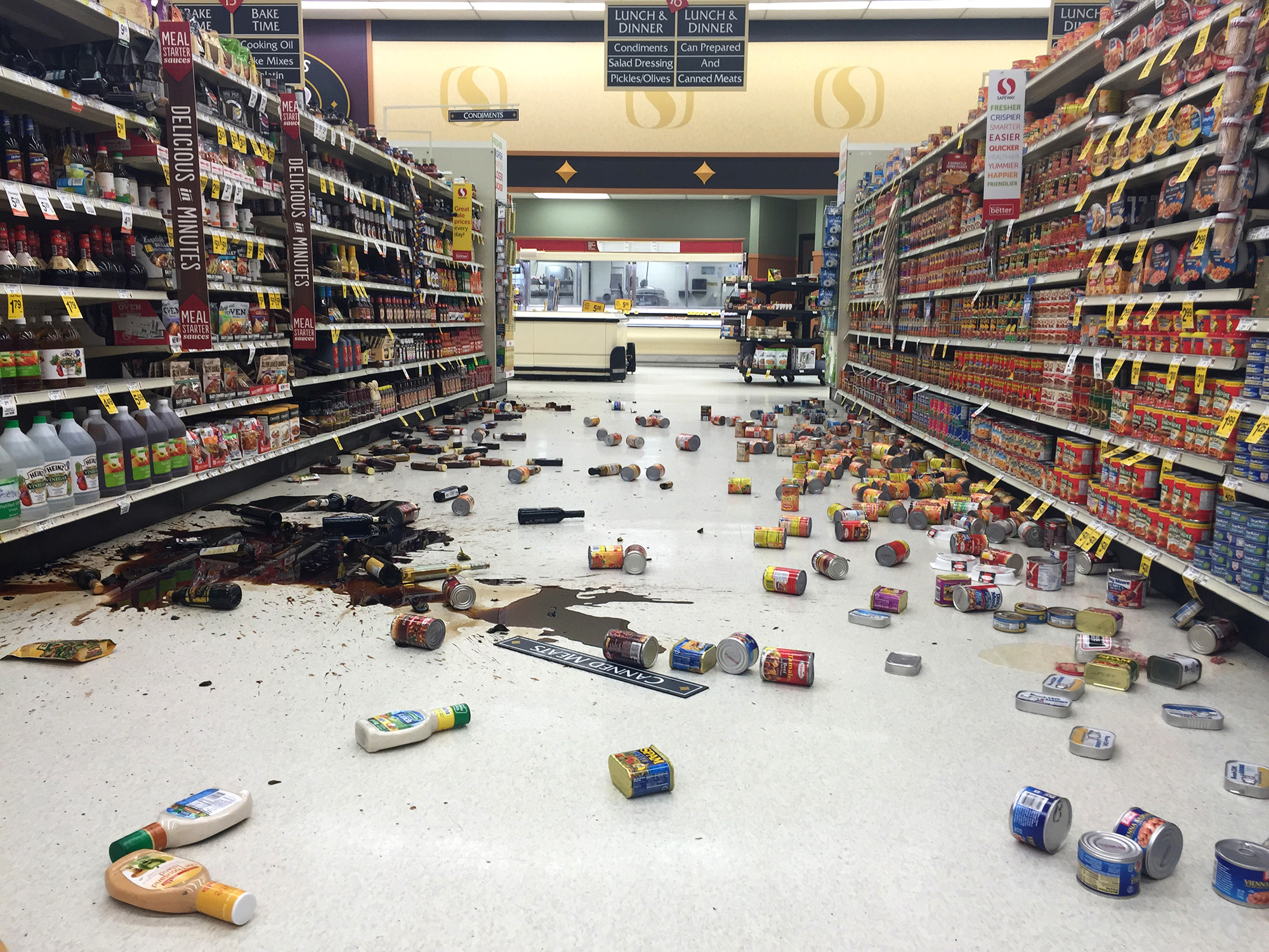 In this photo provided by Vincent Nusunginya, items fallen from the shelves litter the aisles inside a Safeway grocery store following a magnitude 6.8 earthquake on the Kenai Peninsula on Sunday Jan. 24, 2016, in south-central Alaska. The quake knocked items off shelves and walls in south-central Alaska and jolted the nerves of residents in this earthquake prone region, but there were no immediate reports of injuries.