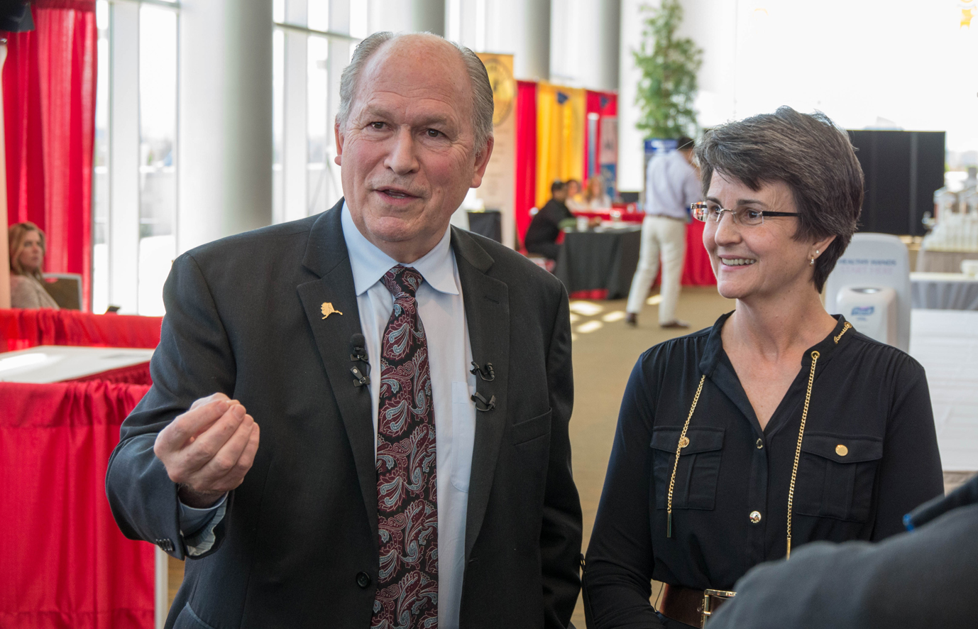 Gov. Bill Walker and Susan Carney talk to the press after making the announcement Thursday.
