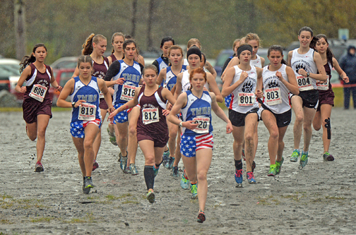 The 4A girls run at the start of the Region V championships on Saturday at Sandy Beach.
