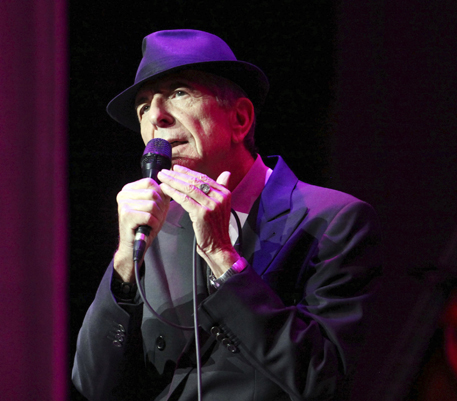 In this March 22, 2013 file photo, Leonard Cohen performs on the Old Ideas World Tour, at The Fabulous Fox Theatre in Atlanta. Cohen, the gravelly-voiced Canadian singer-songwriter of hits like “Hallelujah,” "Suzanne” and "Bird on a Wire," has died, his management said in a statement Thursday, Nov. 9, 2016. He was 82.