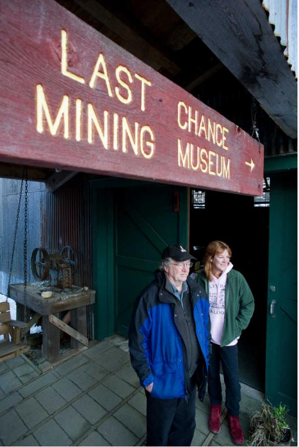 In this file photo from November 2011, Gary Gillette and Renee Hughes stand at the Last Chance Mining Museum where they have lived for 20 years.