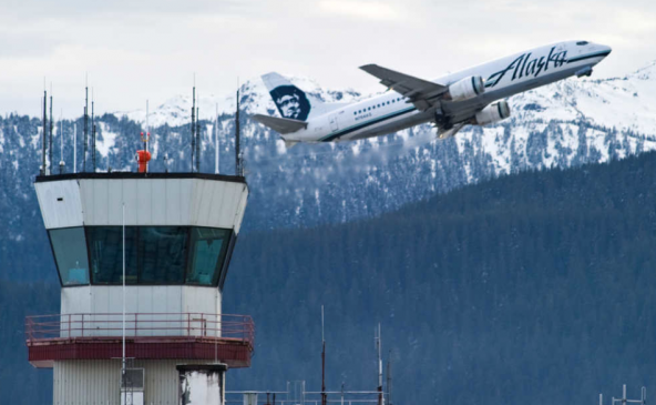An Alaska Airlines jet lifts off in December 2014.