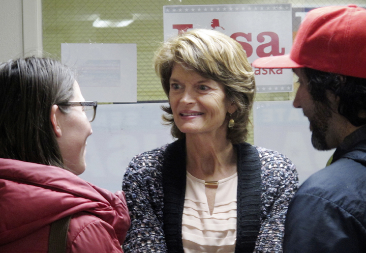 In this photo taken Oct. 17, Republican U.S. Sen. Lisa Murkowski listens during a meet-and-greet at her campaign headquarters in Juneau.
