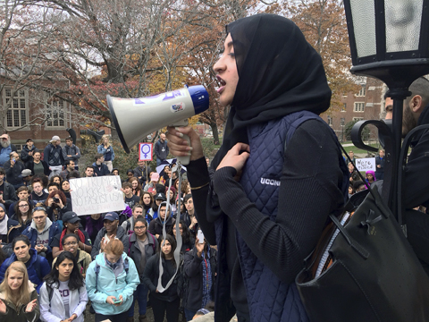 In this Nov. 9 photo, Eeman Abbasi speaks during a protest on the University of Connecticut campus against the election of Republican Donald Trump as president in Storrs, Conn. Abbasi, a junior psychology and neurobiology major, said as a Muslim student she feels that the American people told her Tuesday night that even though she was born in this country she doesn't belong here.