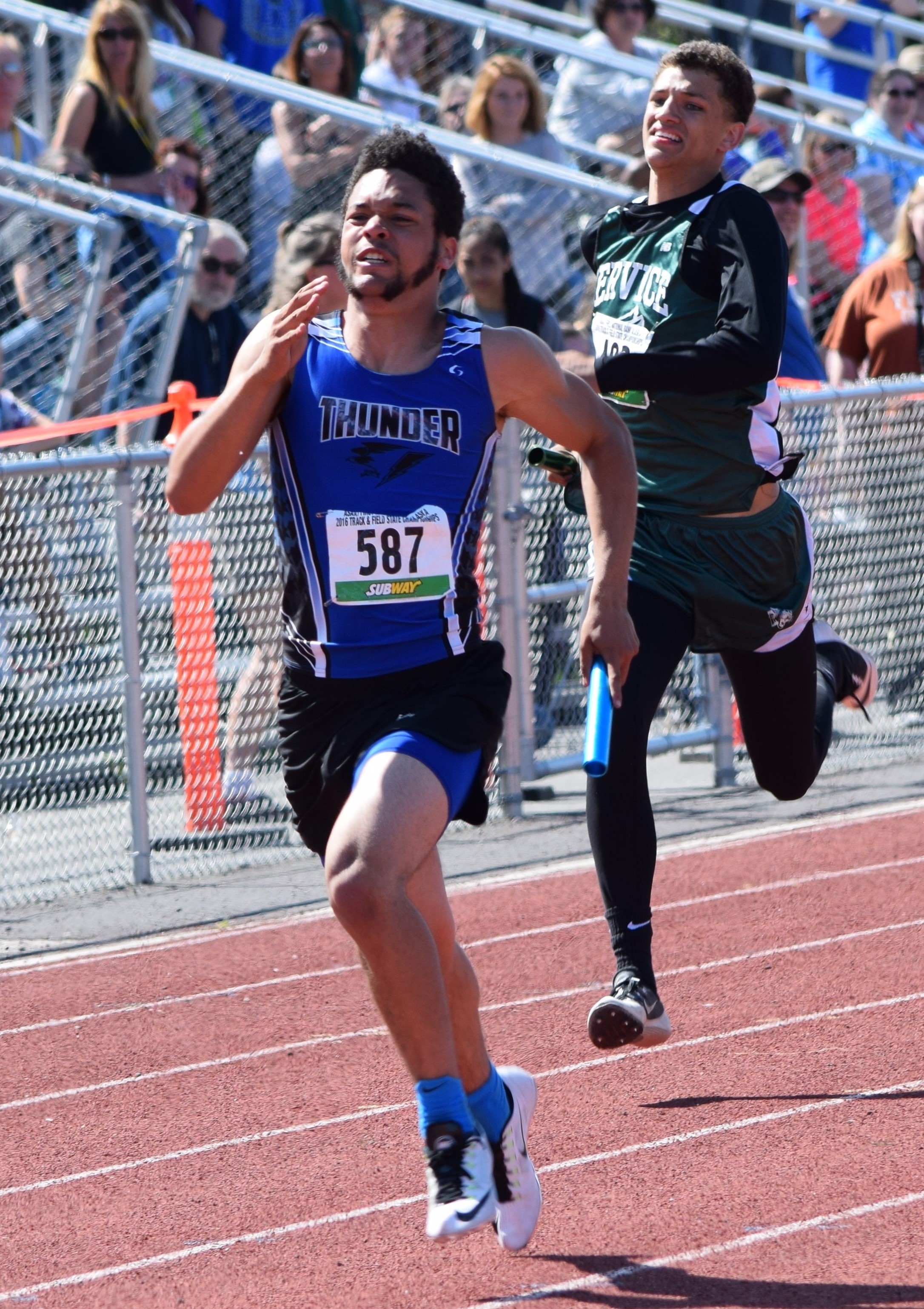 Thunder Mountain's Aiden Hildebrand competes in the 4x100-meter relay Saturday in Anchorage during the state track and field championships. The TMHS team finished first with a time of 43.73 seconds.