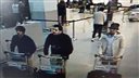 In this image provided by the Belgian Federal Police in Brussels on Tuesday of three men who are suspected of taking part in the attacks at Belgium's Zaventem Airport. The man at right is still being sought by the police and two others in the photo that the police issued were according to the Belgian prosecutors 'probably' suicide bombers. Bombs exploded at the Brussels airport and one of the city's metro stations Tuesday, killing and wounding scores of people, as a European capital was again locked down amid heightened security threats.