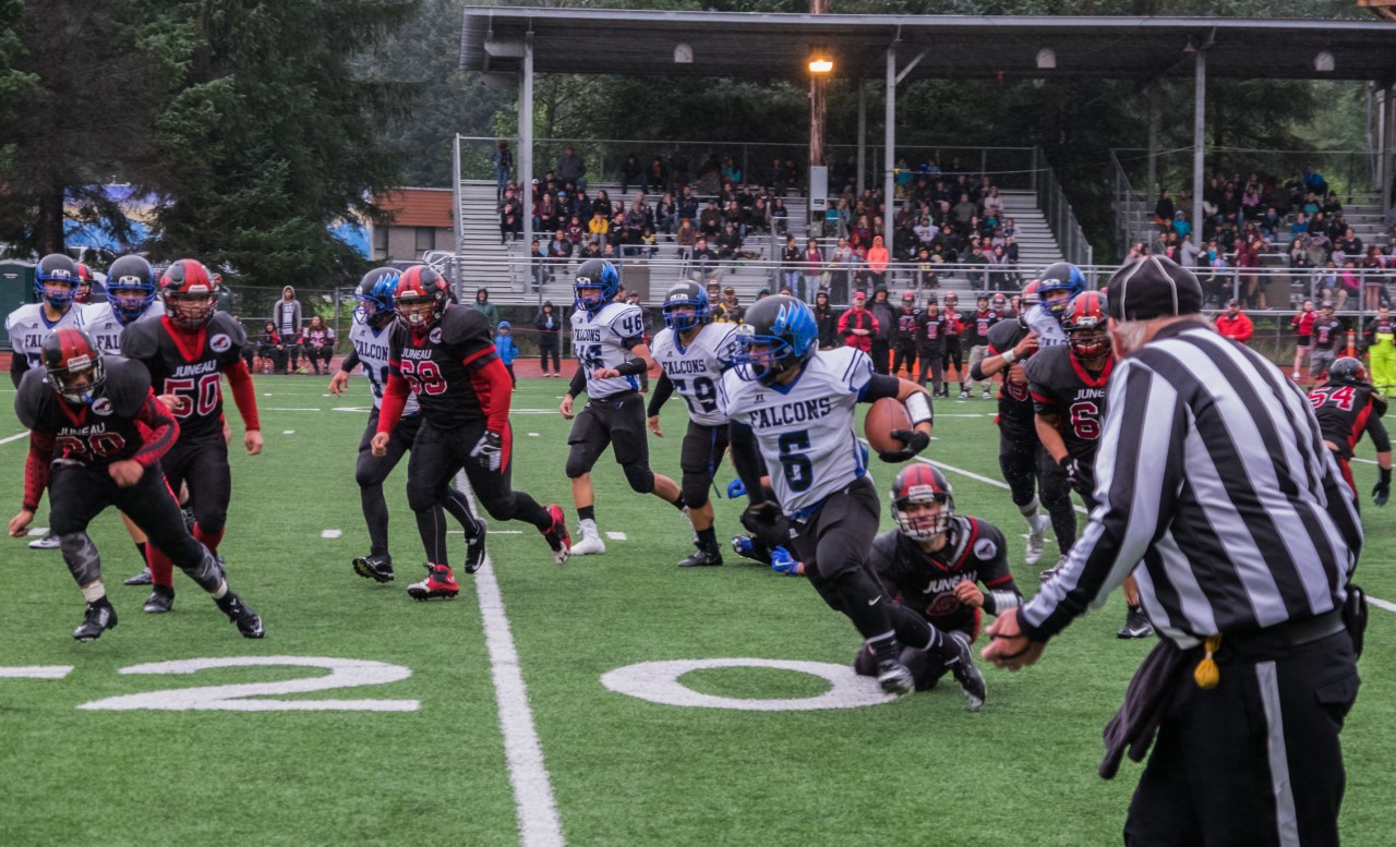 Thunder Mountain High School defeated Juneau-Douglas High School 50-20 on Saturday at Adair Kennedy Field to kick off both schools' seasons.