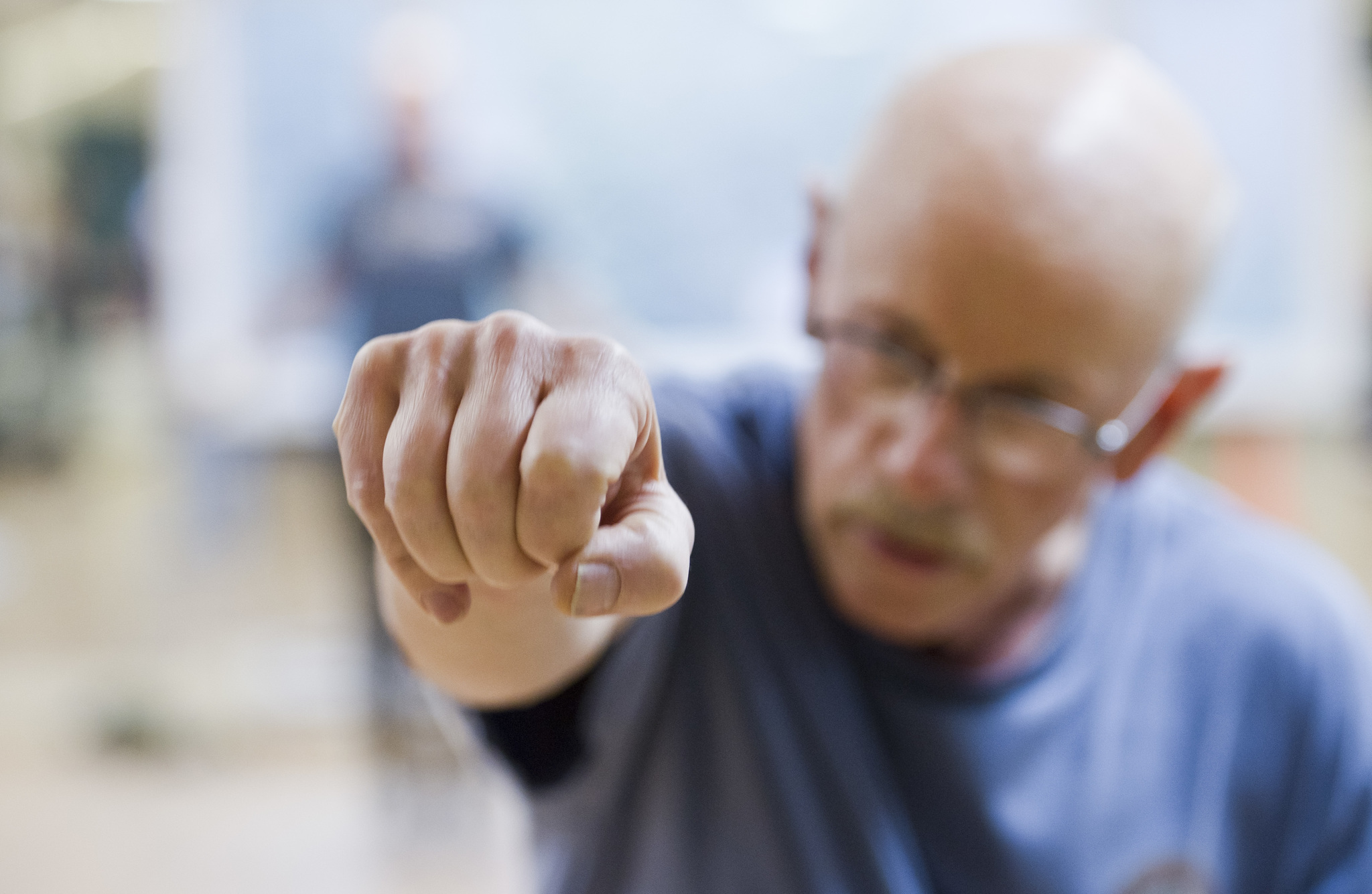 Tim Smith shadow boxes during the Rock Steady Boxing class at Pavitt Health & Fitness on Thursday. The class is offered to those with various stages of Parkinson’s disease. (Michael Penn | Juneau Empire)