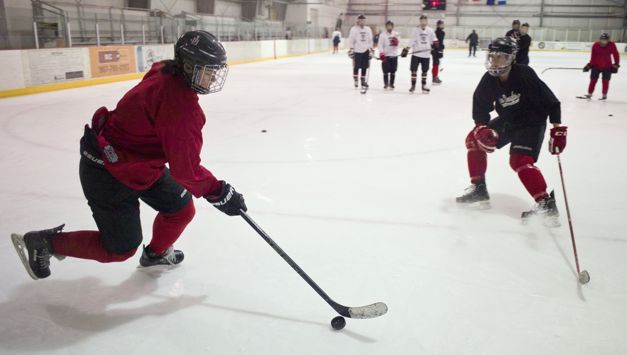 PHOTOS BY Michael Penn | Juneau Empire The Juneau-Douglas High School hockey team practices at Treadwell Arena on Wednesday.