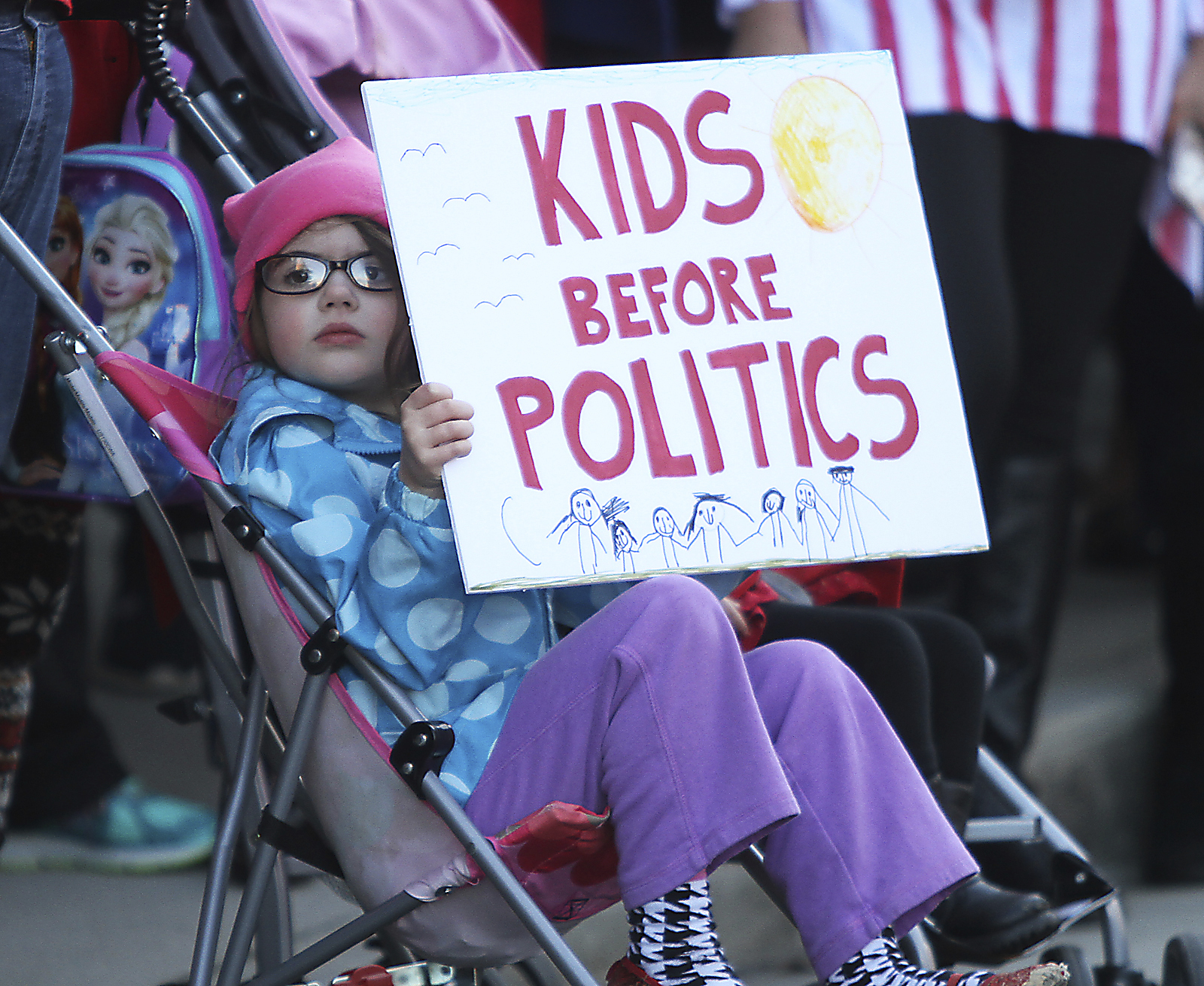 In a Monday Jan. 30 photo, Laurel Pratt holds a sign with protestors gathered in front of U.S. Senator Lamar Alexander’s office in Knoxville, Tenn. to object to the nomination of Betsy DeVos as Secreratary of Education. A Senate committee on Tuesday approved Republican donor and school choice advocate DeVos for education secretary, even as two GOP senators expressed some reservations. (Tom Sherlin | The Daily Times via AP)