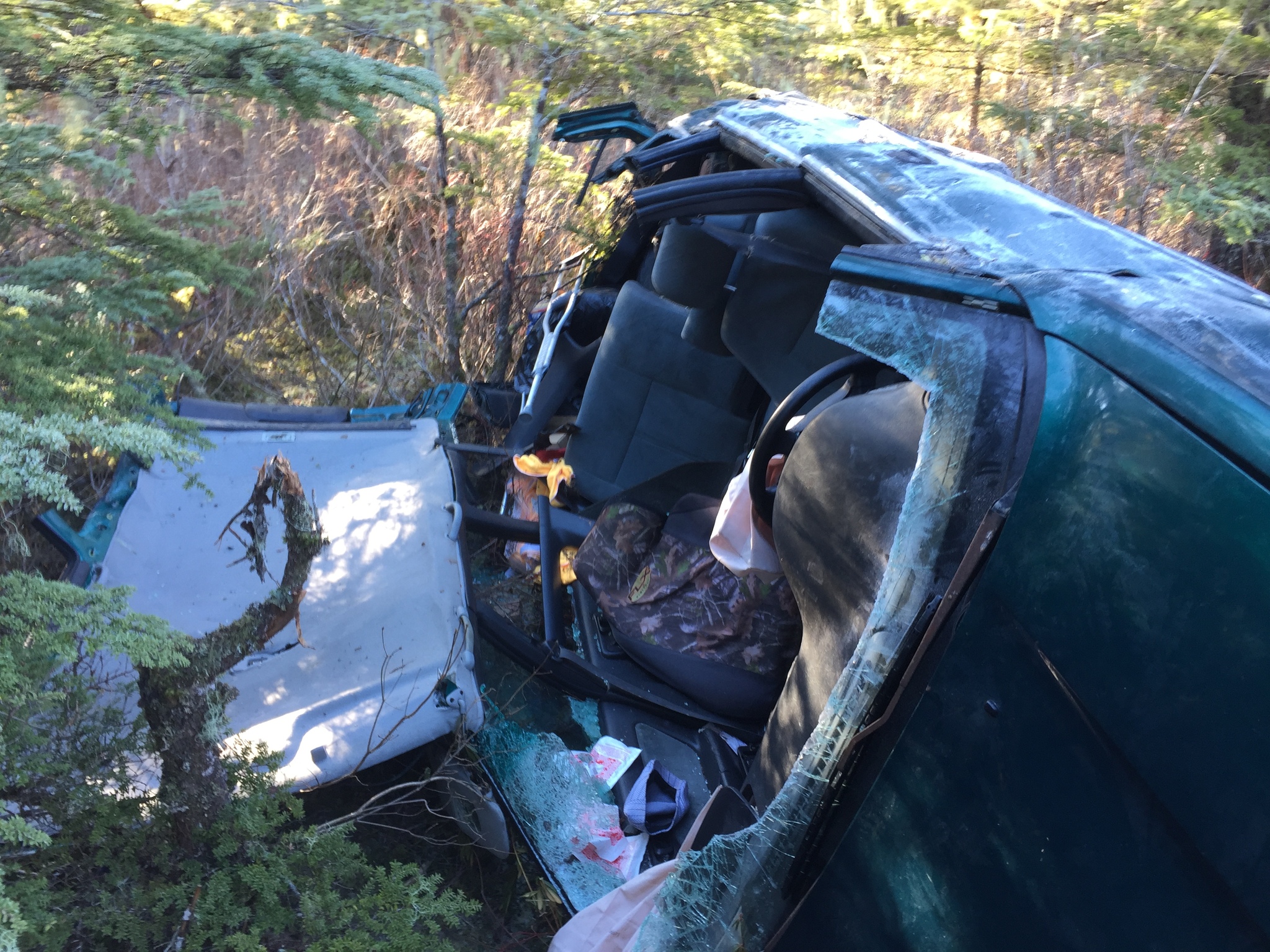 The scene of a car crash near the end of North Douglas Highway. (Michael Penn | Juneau Empire)
