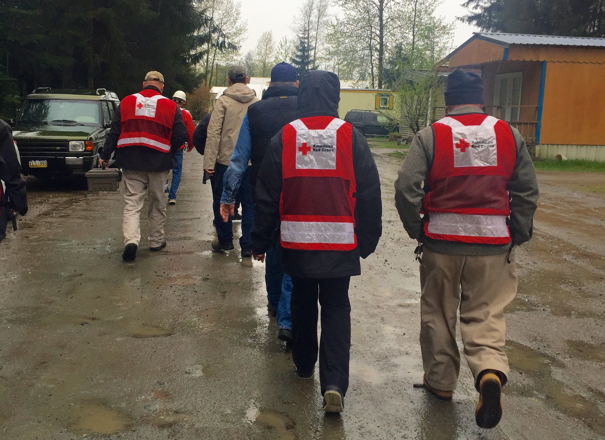 Red Cross of Alaska volunteers go door to door in Juneau, offering to check and install smoke alarms at no cost. The installations were part of the Red Cross Home Fire Campaign, an ongoing effort that aims to reduce home fire deaths and injuries by 25 percent. (Photo courtesy American Red Cross)