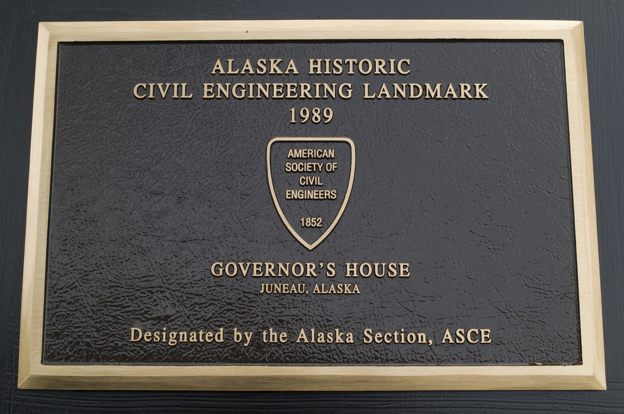 A new American Society of Civil Engineers plaque recognizing the Governor’s House as a Historic Civil Engineering Landmark in Juneau on Wednesday. (Michael Penn | Juneau Empire)