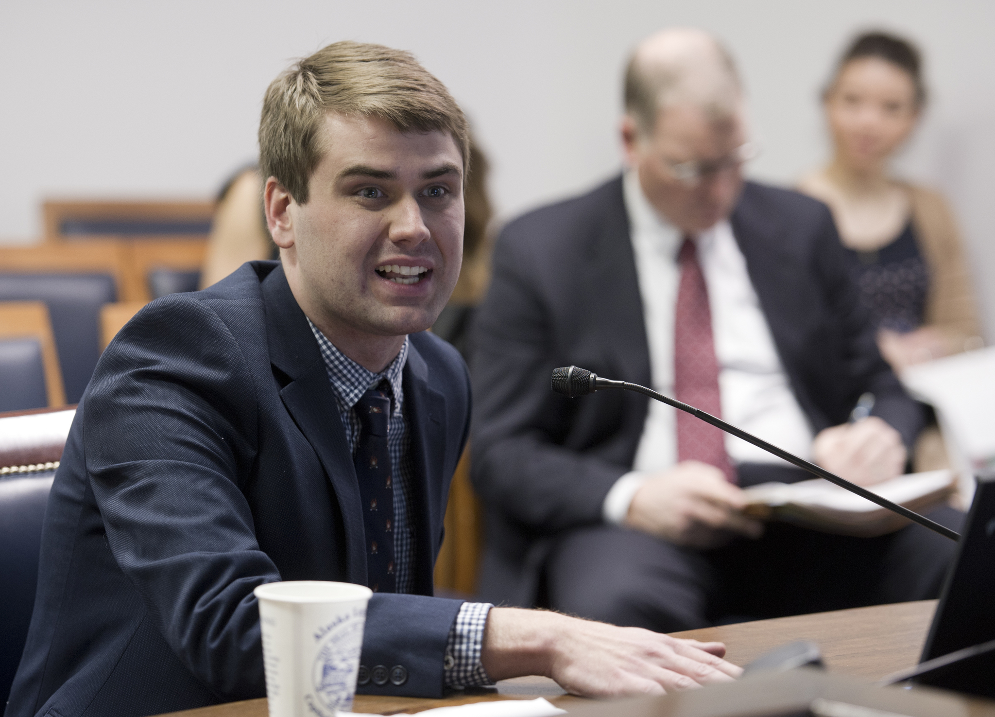 Brian Fechter, policy analyst for the Office of Management and Budget, speaks to House Transportation Committee members Tuesday about HB 60, the motor fuel tax bill. (Michael Penn | Juneau Empire)