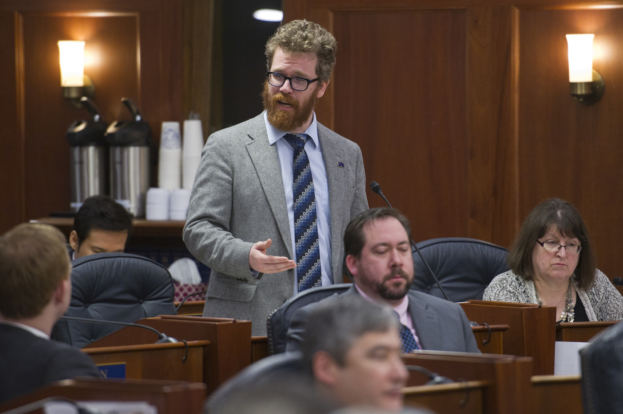 Rep. Justin Parish, D-Juneau, speaks against a resolution to allow oil drilling in the Arctic National Wildlife Refuge during a House floor sesison on Wednesday. The House voted in favor of the resolution. (Michael Penn | Juneau Empire)