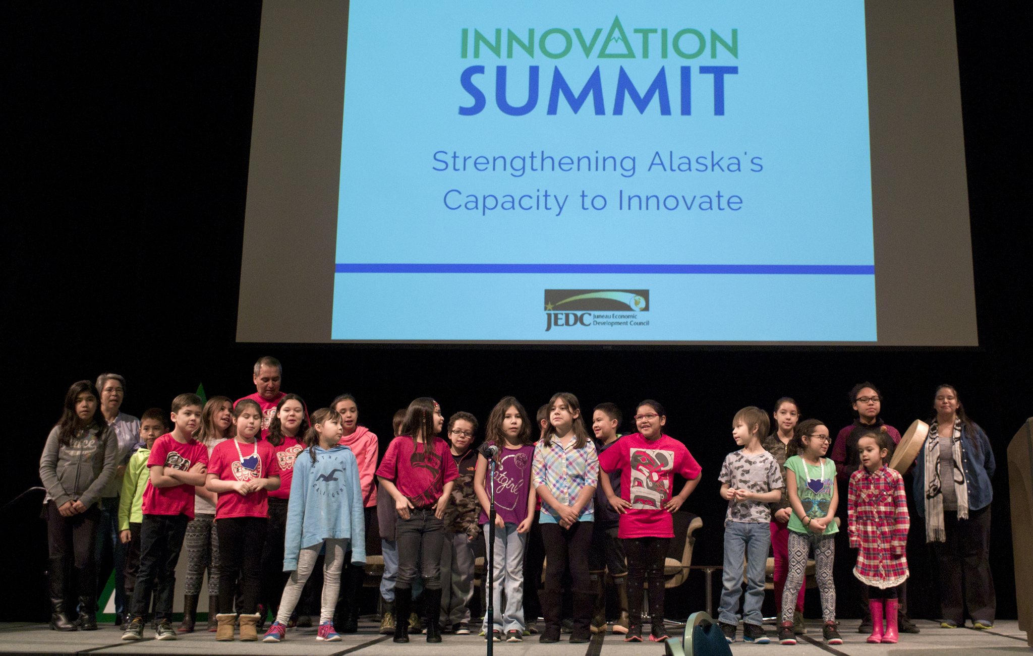 Harborview Elementary School students in the Tlingit language immersion program perform their Elizabeth Peratrovich Day rap during a visit to the Juneau Economic Development Council’s Innovation Summit at Centennial Hall on Thursday. (Michael Penn | Juneau Empire)