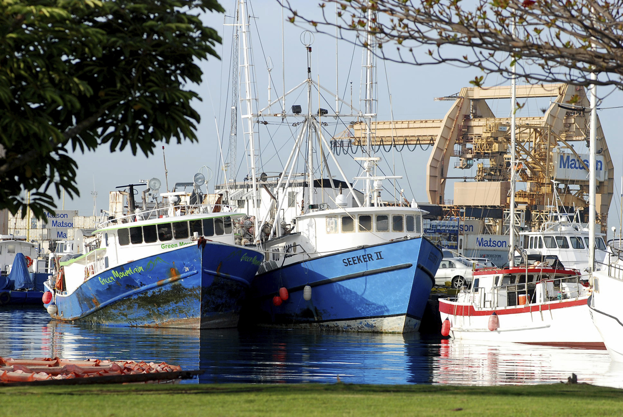 This Feb. 2 photo shows commercial fishing boats docked at Pier 38 in Honolulu. (Caleb Jones | The Associated Press)