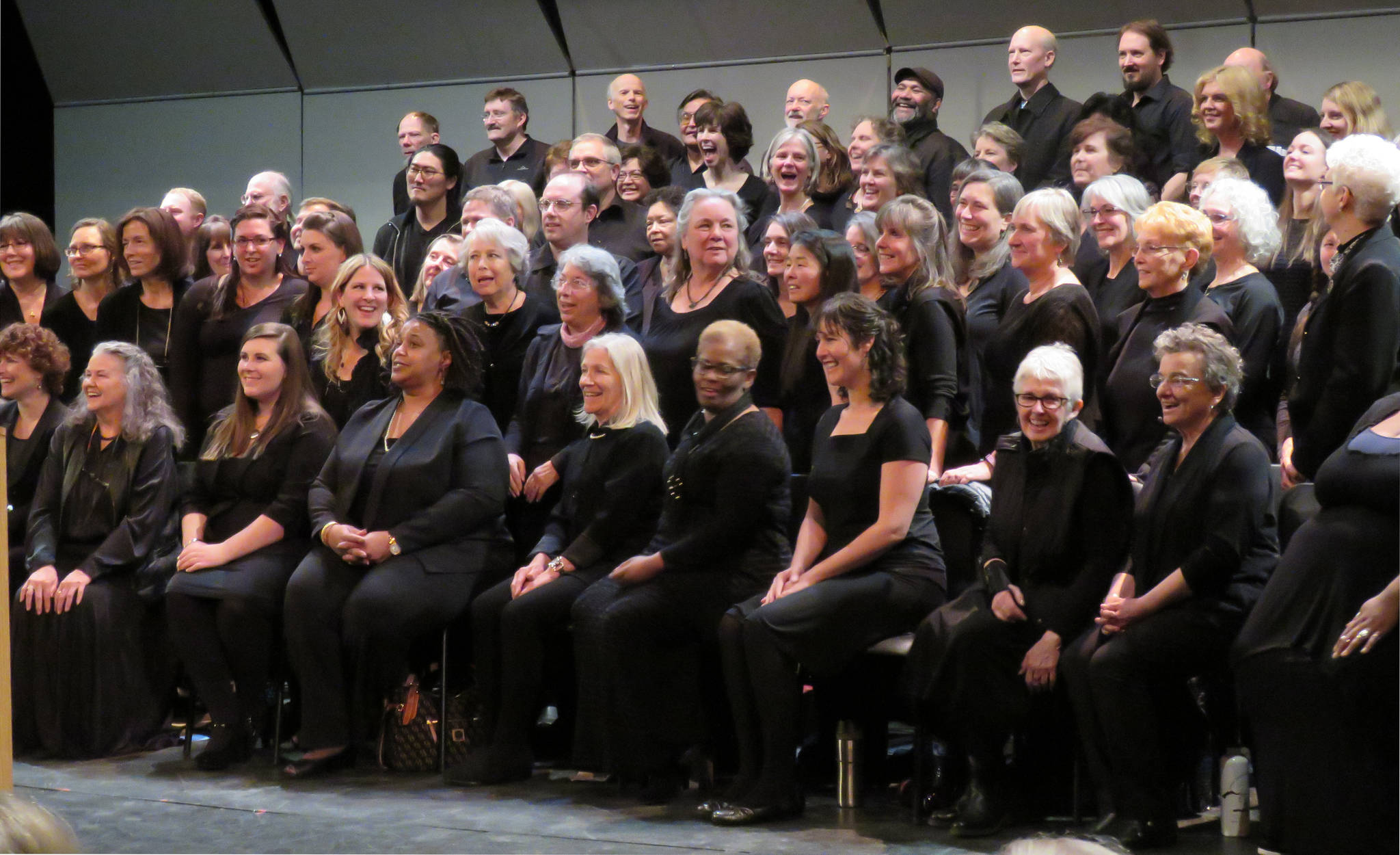 Members of the Juneau Gospel Workshop Choir laugh between songs. Mary Catharine Martin | Capital City Weekly
