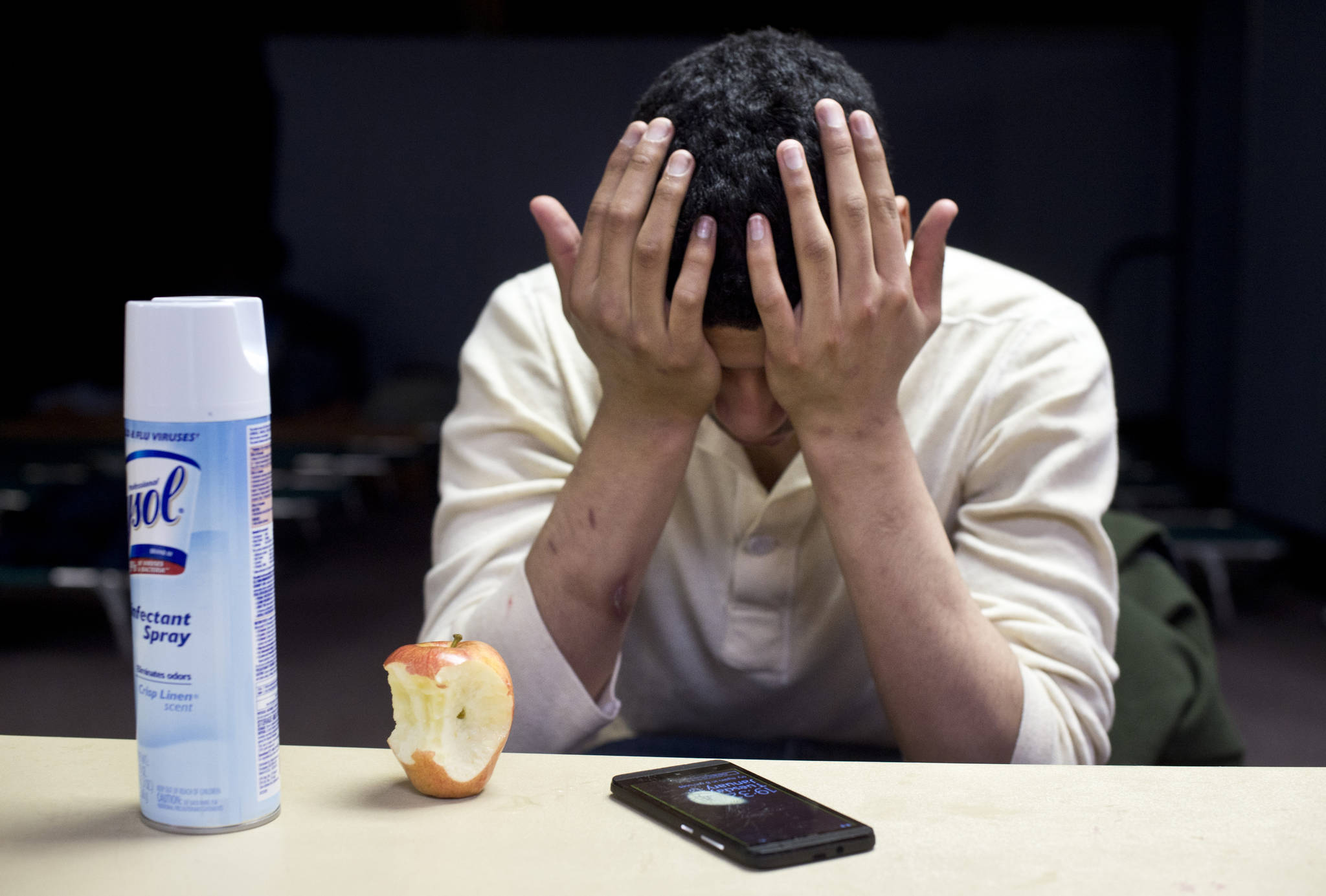River Parrish, 20, spends the night at the warming shelter provided by The Salvation Army on Tuesday, March 14, 2017. Originally from Southern California, Parrish came to Juneau from Kenai last July to enter a drug rehabilitation program. Parrish said he would like to go back to school and become involved with building robotic medical equipment. (Michael Penn | Juneau Empire)
