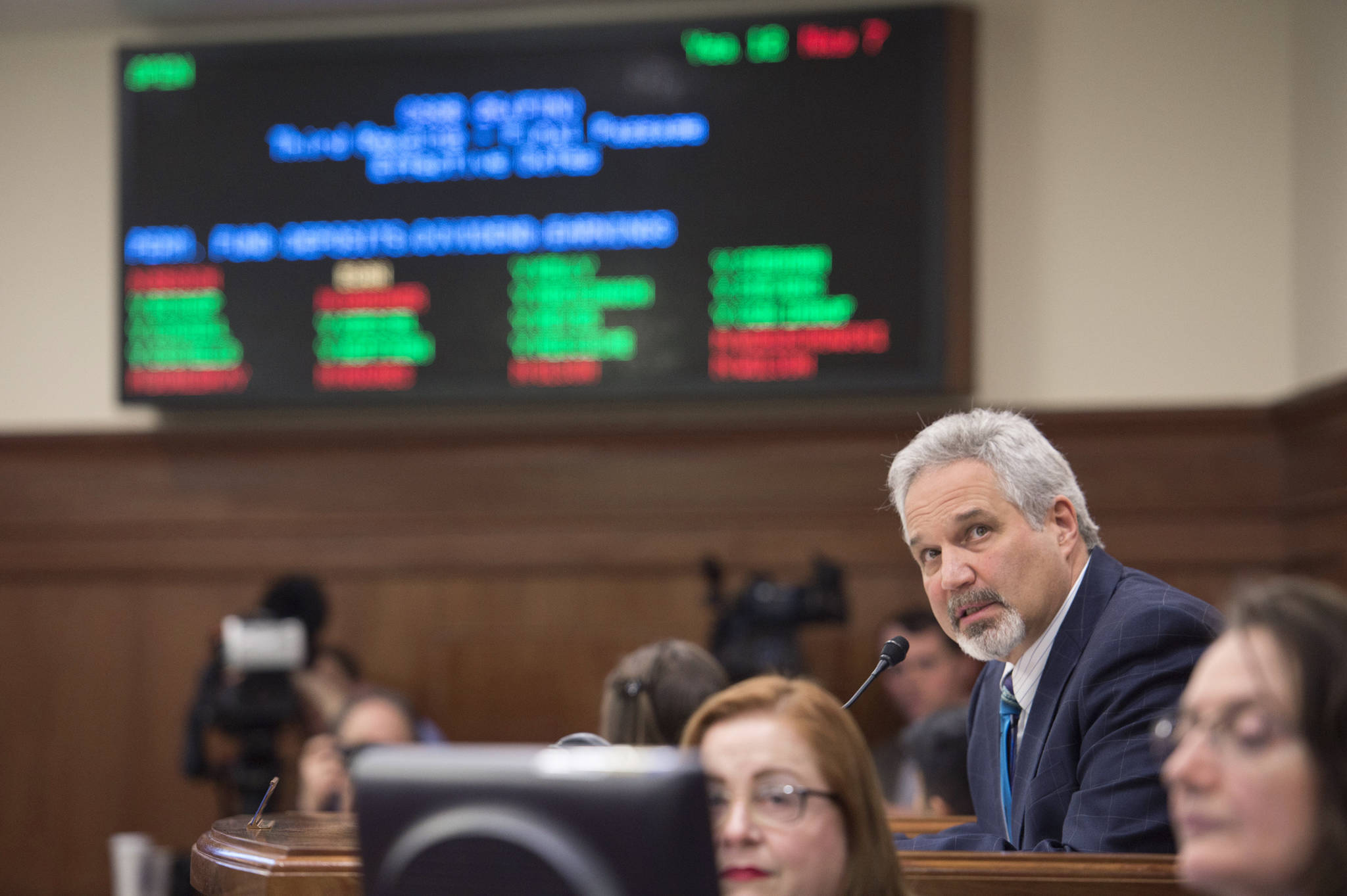 Senate President Pete Kelly watches the vote on SB 26 in the Senate chambers on Wednesday. The Senate voted to use a portion of earnings from the Alaska Permanent Fund to fund government and cap dividends at $1,000 per person. (Michael Penn | Juneau Empire)