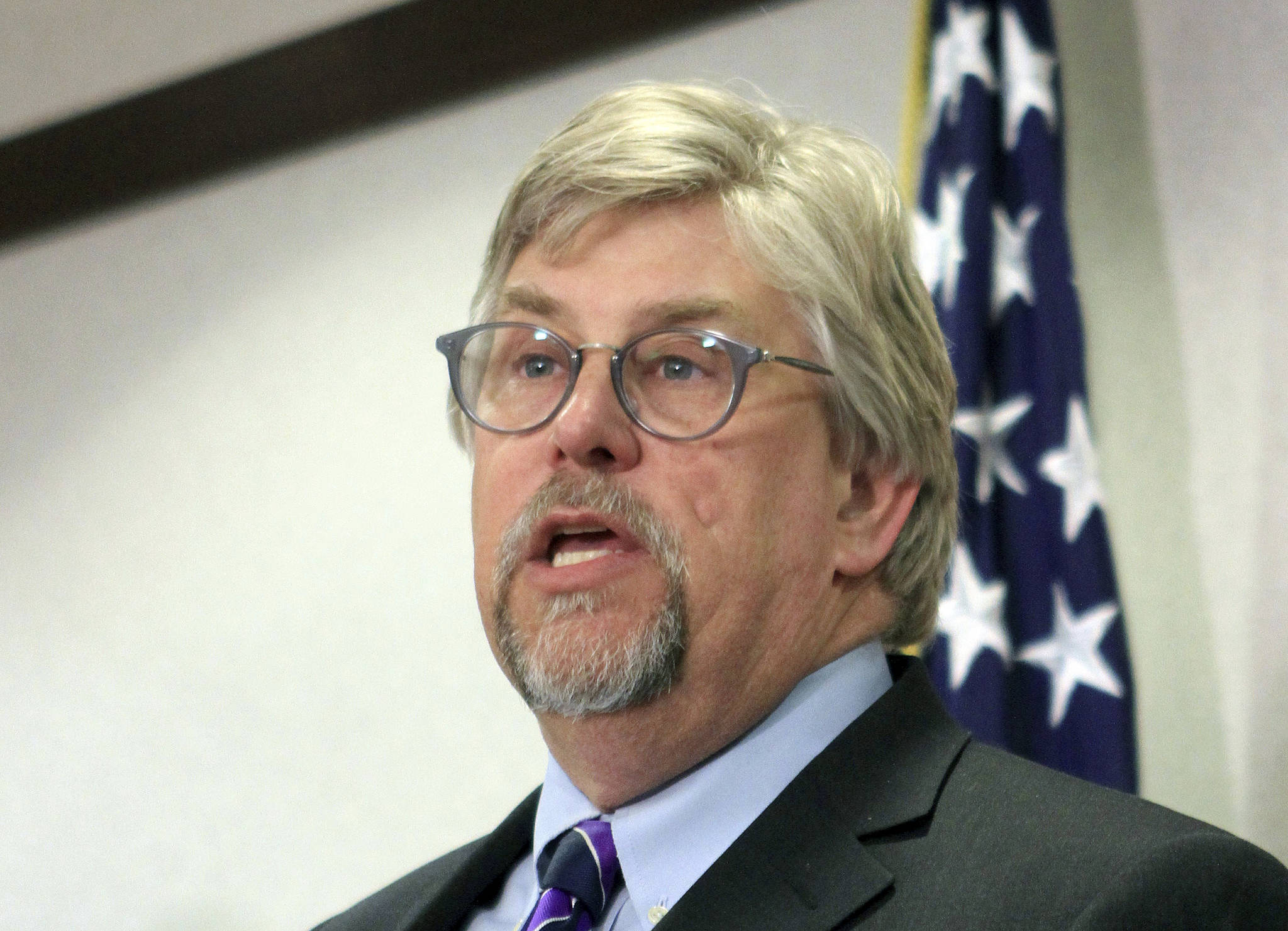 Acting U.S. Attorney for Alaska Bryan Schroder announces federal murder charges against John Pearl Smith II Thursday in Anchorage. An indictment says Smith killed Ben Gross and Crystal Denardi in June 2016 and wounded a third person while attempting to rob them near Wasilla. Schroder said federal prosecutors may seek the death penalty in the case. (Dan Joling | The Associated Press)