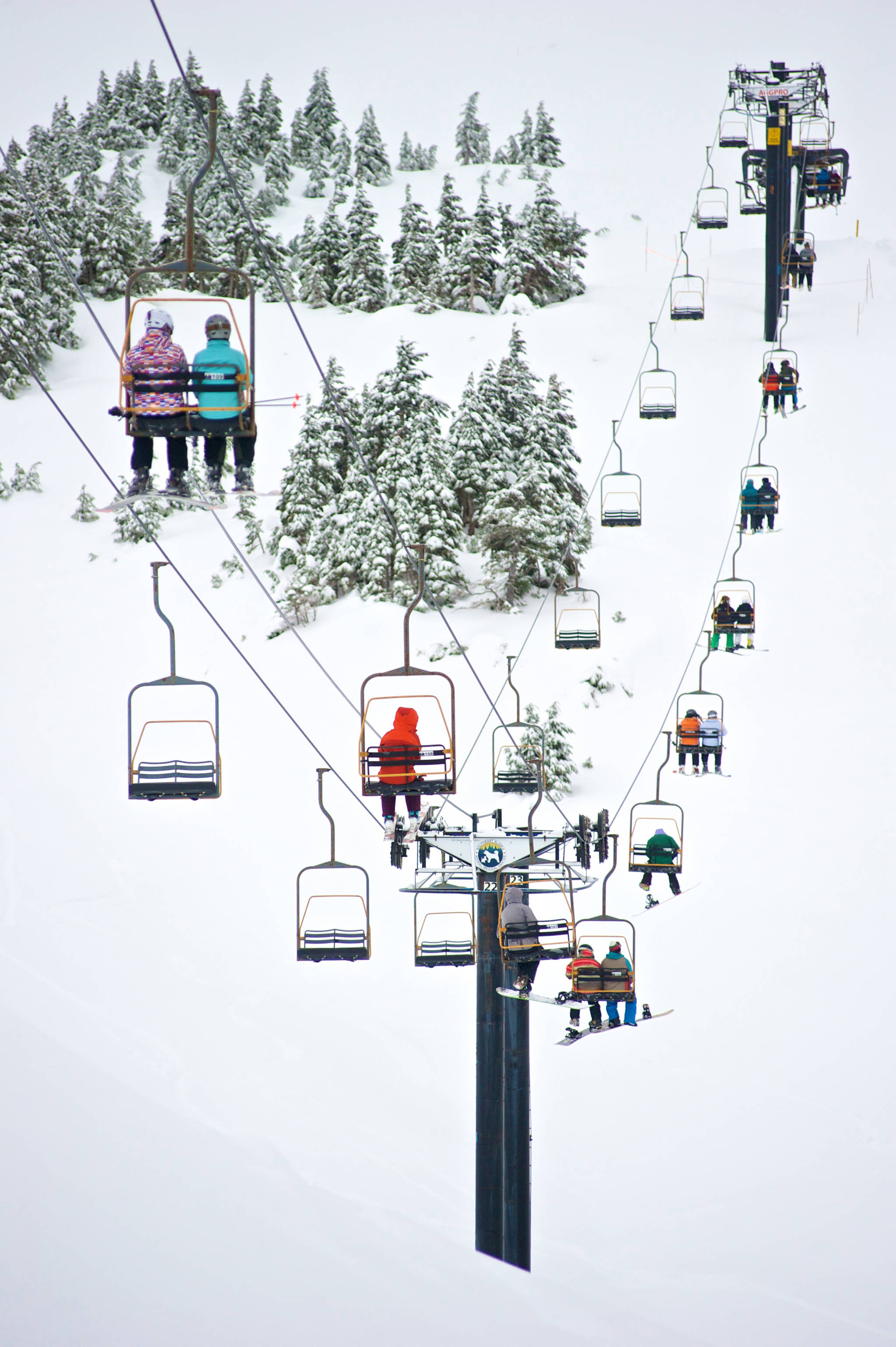 Skiers ride the Black Bear Chairlift on its opening day at Eaglecrest in January 2015. (Michael Penn | Juneau Empire file)