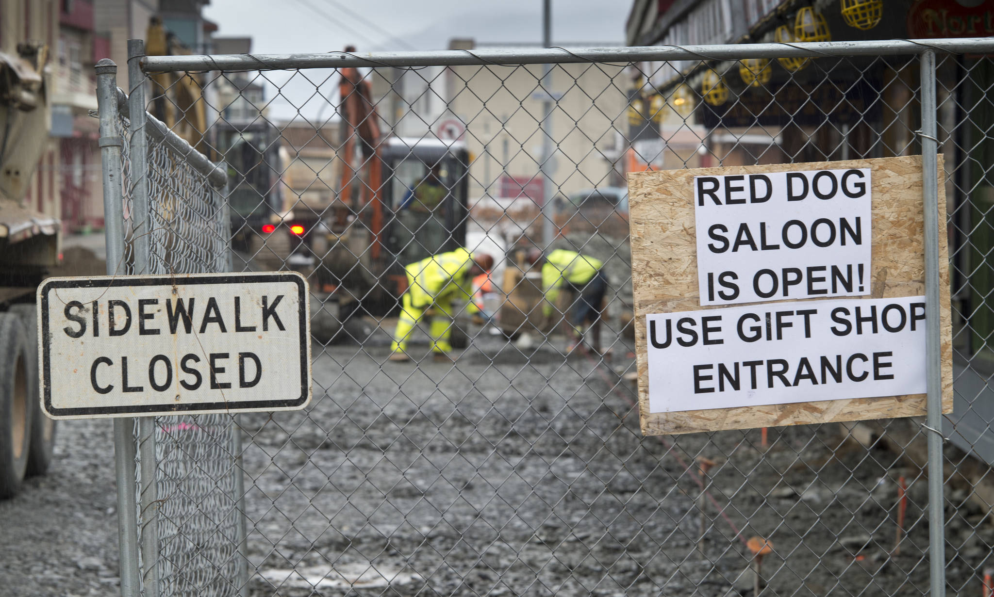 Pedestrian traffic has been closed on both sides of South Franklin Street as construction continues on Thursday. (Michael Penn | Juneau Empire)