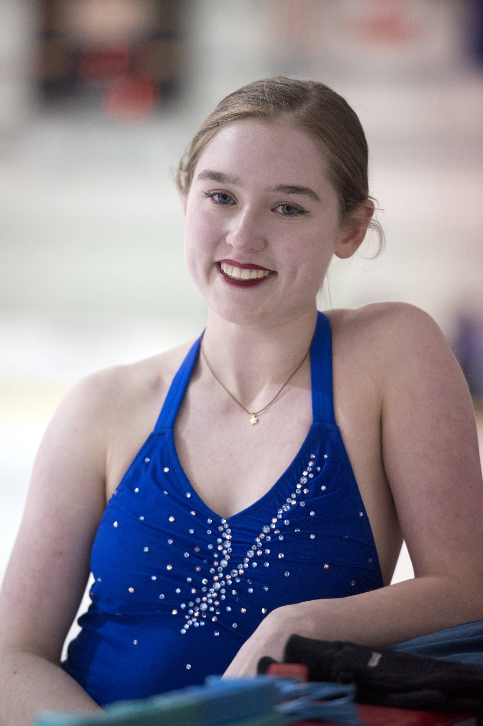 Laurie Balstad, 18, a member of the Juneau Skating Club, stops to pose for a picture during practice at Treadwell Arena on Friday, March 3, 2017. (Michael Penn | Juneau Empire)