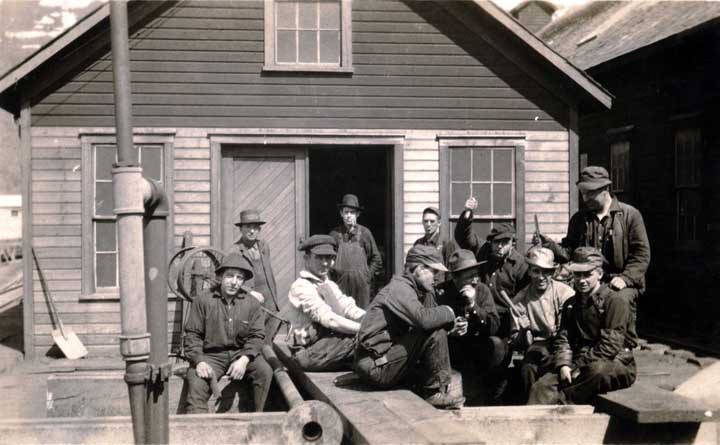 Treadwell workers outside mine building, circa 1918. (Alaska State Library)