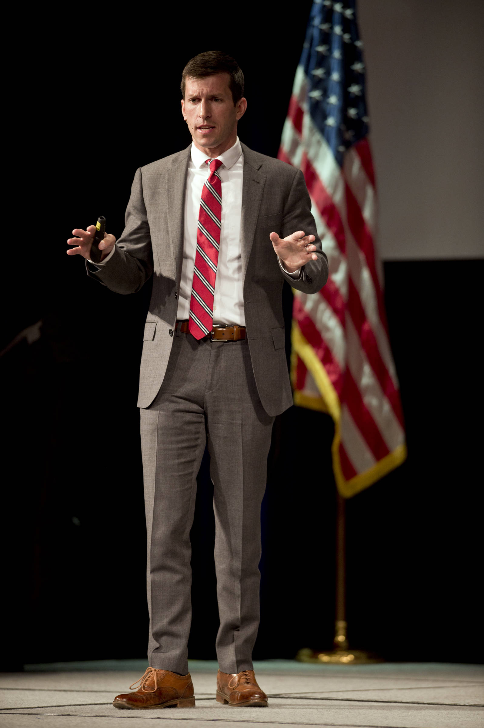 Former Navy SEAL Lt. Brandon Stone speaks at the Pillars of America at Centennial Hall on Wednesday, April 19, 2017. Stone, who grew up in Juneau, is the first of three speakers in the annual speaker series hosted by the Juneau Glacier Valley Rotary Club. W. Mitchell speaks on April 26 and Larry Csonka on April 3. (Michael Penn | Juneau Empire)