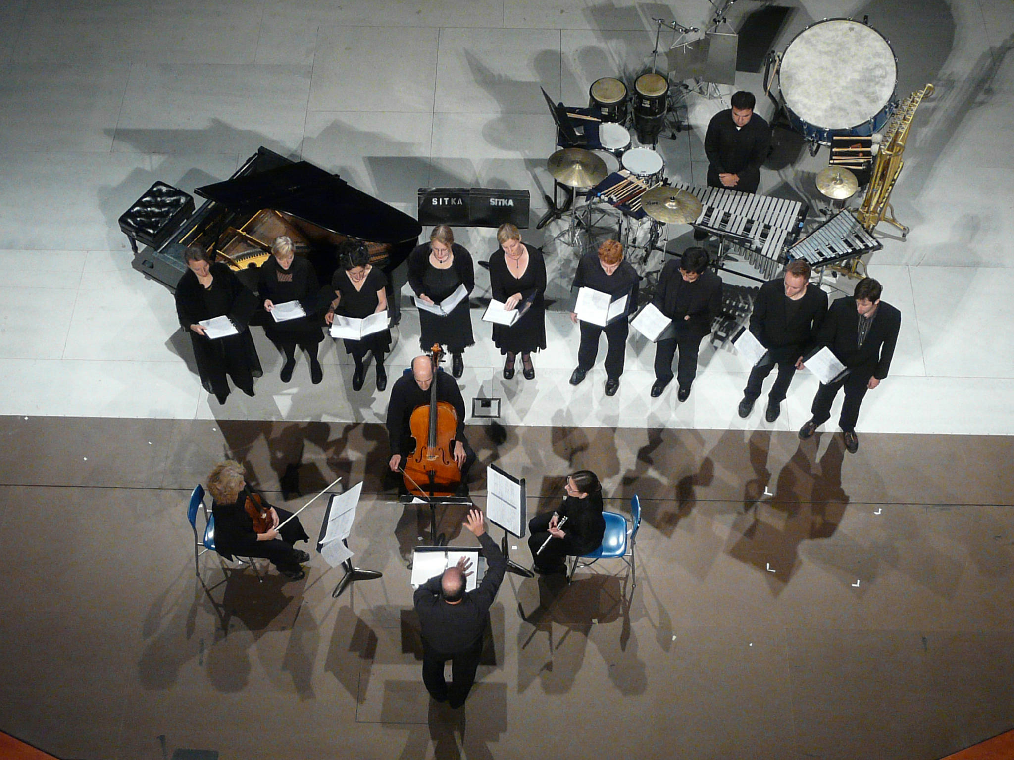 Ed Littlefield, with percussion instruments at top right, performs in Sitka. Courtesy image.