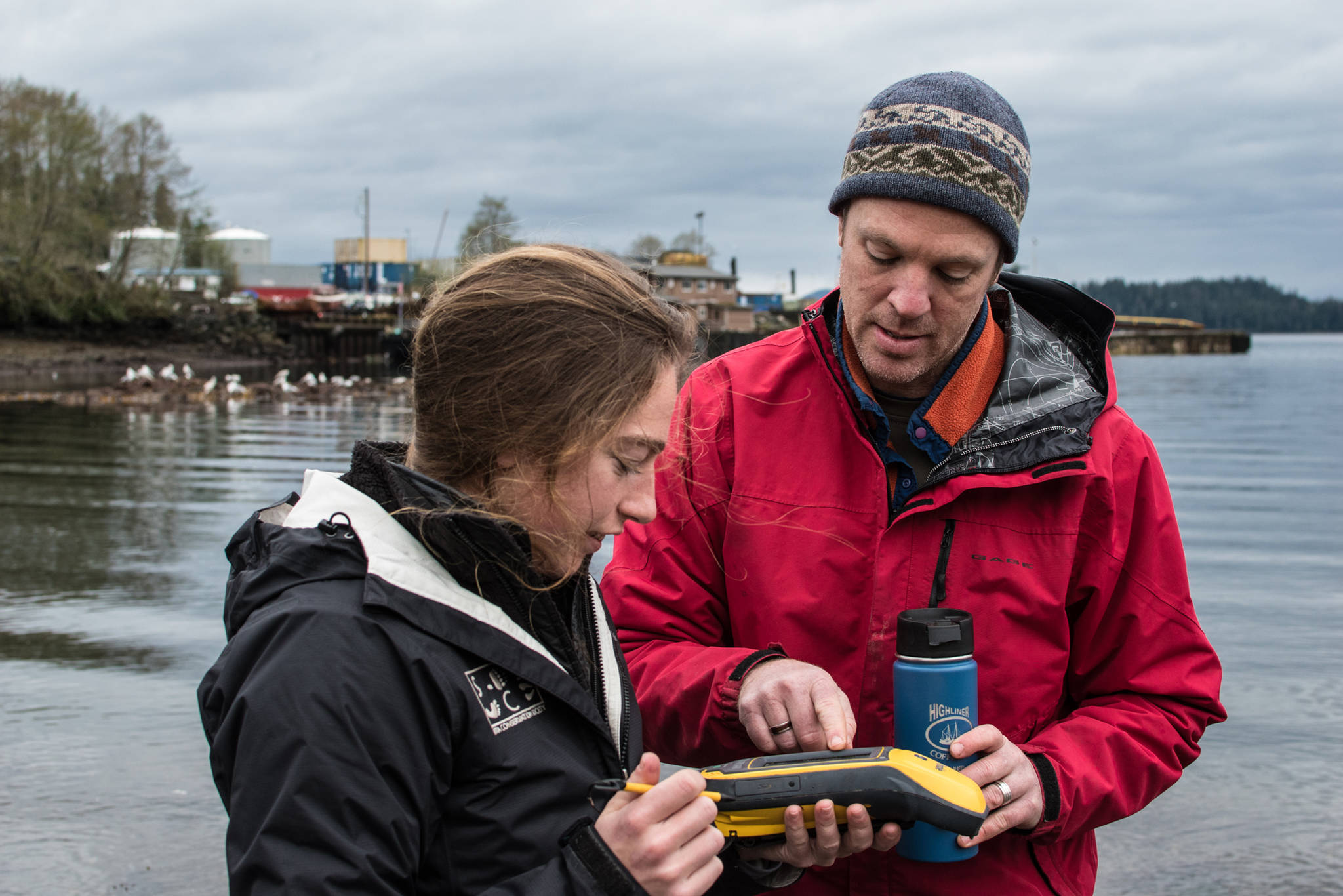 Chris Whitehead and Esther Kennedy use GPS to map the extent of Sitka’s local clamming beach. Photo by Bethany Goodrich | For the Capital City Weekly