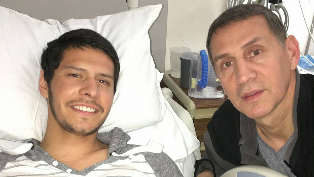 Stabbing victim Monte Nix, with his father, Al, in his Seattle hospital bed. Nix was being discharged Friday afternoon. (Photo courtesy of Nix family)Stabbing victim Monte Nix, with his father, Al, in his Seattle hospital bed. Nix was being discharged Friday afternoon. (Photo courtesy of Nix family)