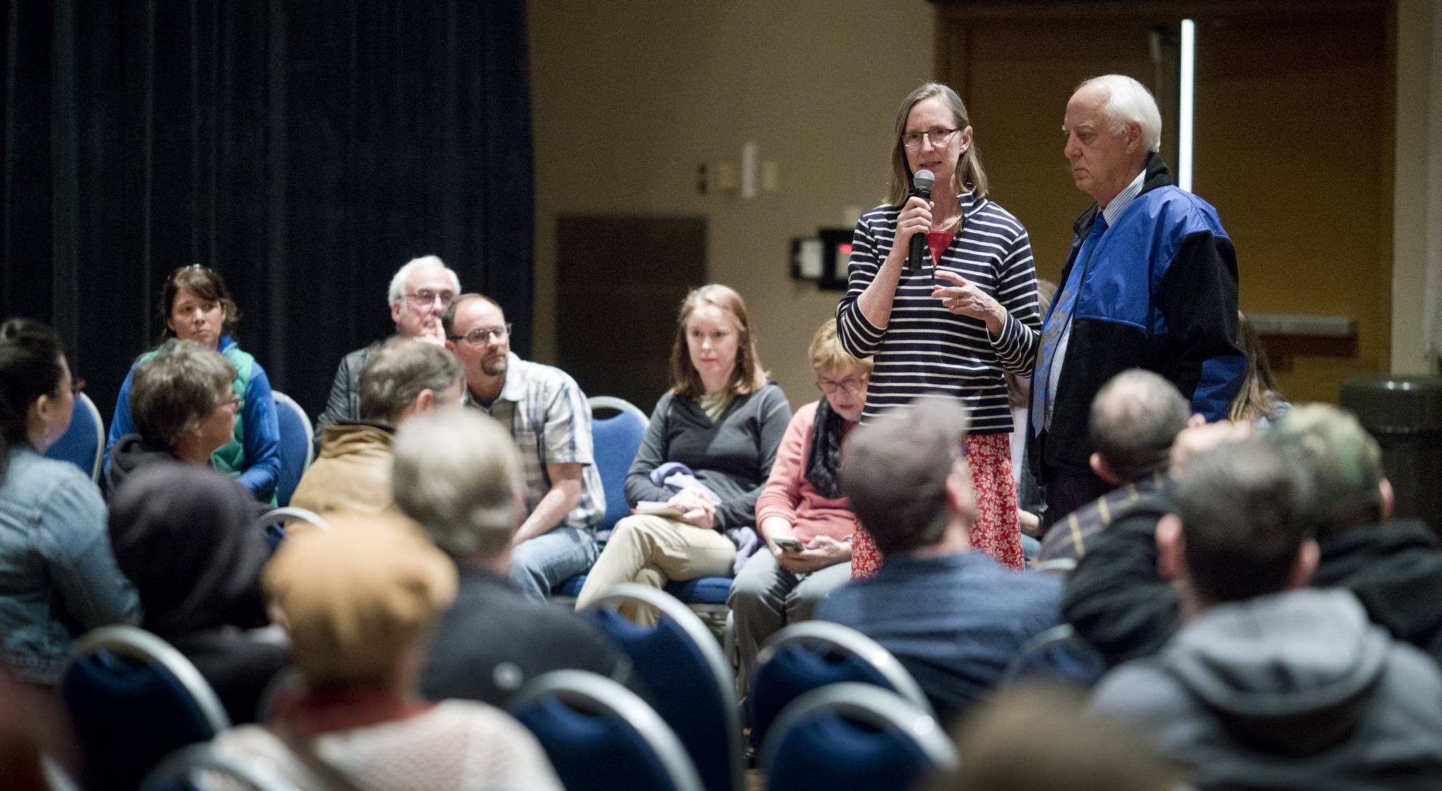 Amy Skilbred, Executive Director of the Juneau Community Foundation, and Mayor Ken Koelsch speak about fundraising for the rebuilding of Project Playground at Twin Lakes during a meeting at Centennial Hall on Tuesday, May 2, 2017. (Michael Penn | Juneau Empire)