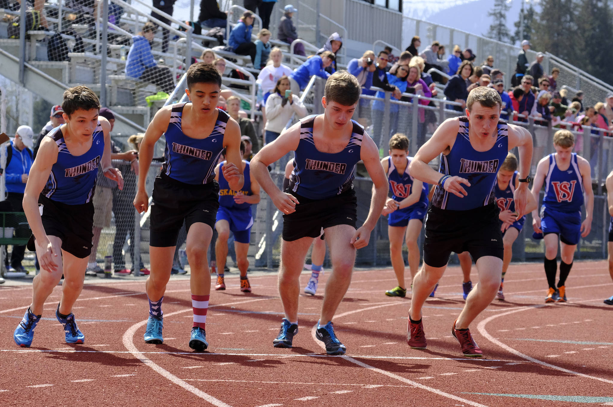 TMHS boys line up at the starting line during the Capital Invitational on Saturday at Thunder Mountain High School. (Lance Nesbitt | For the Juneau Empire)