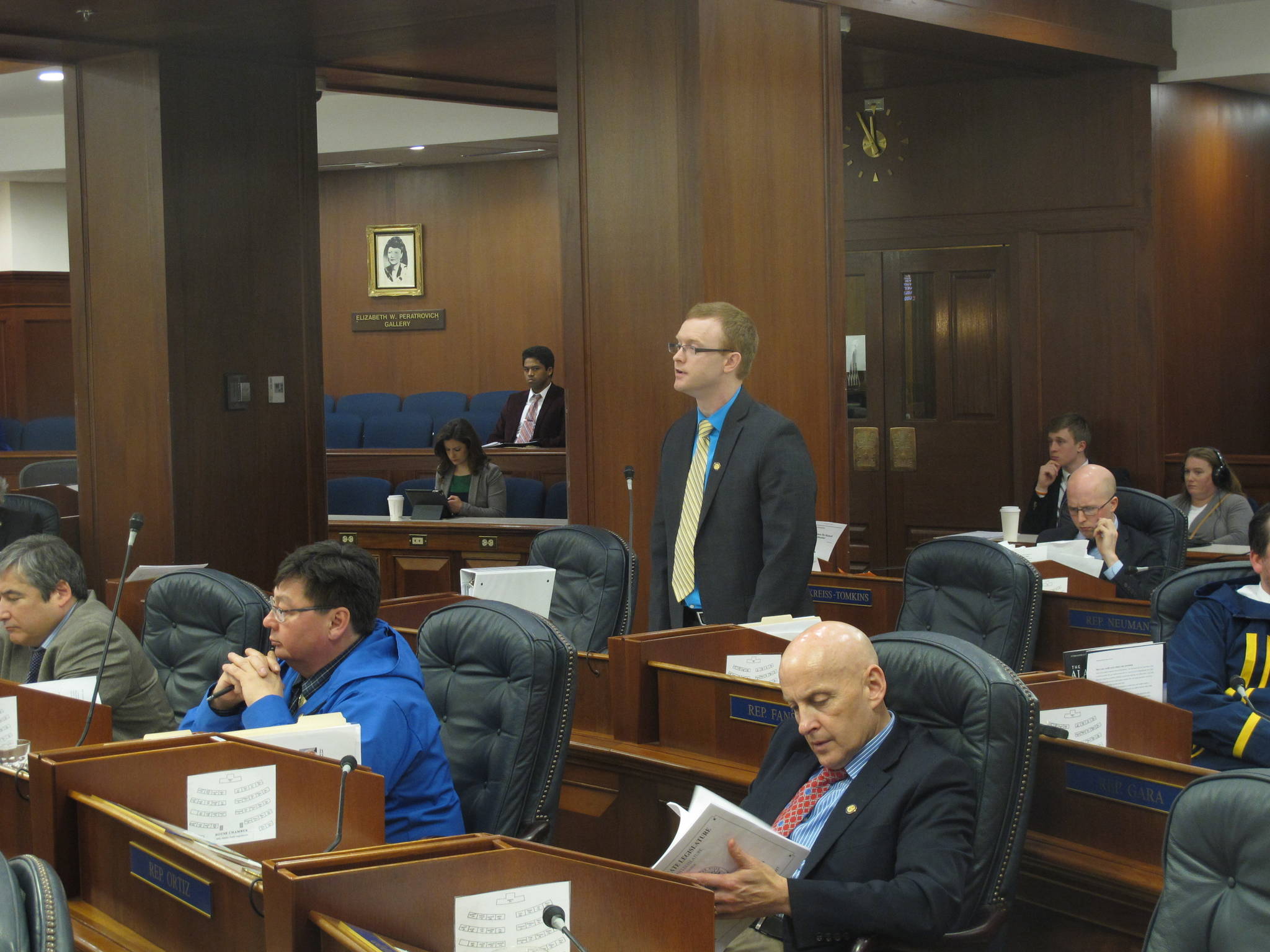 State Rep. David Eastman, standing, speaks on the floor of the House on Friday in Juneau. Eastman, a Republican from Wasilla, has come under pressure from fellow House members to apologize for comments he recently made about abortion. (Becky Bohrer | The Associated press)